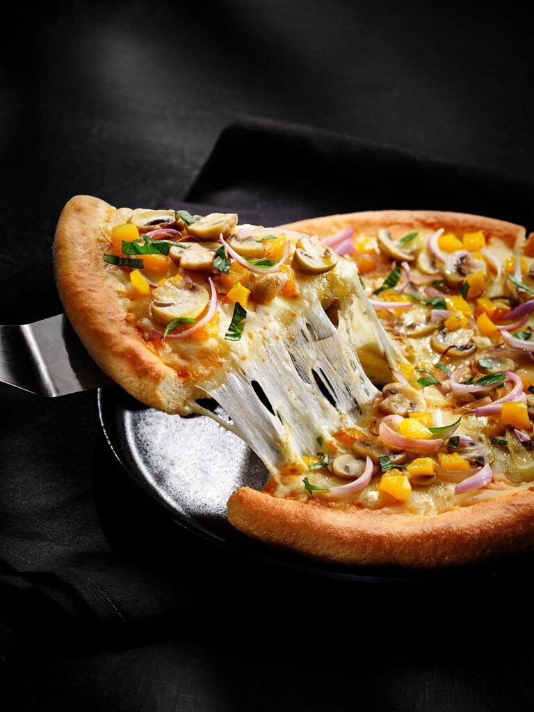 melted cheese pizza, mozzarella, food photographer dubai, food stylist dubai